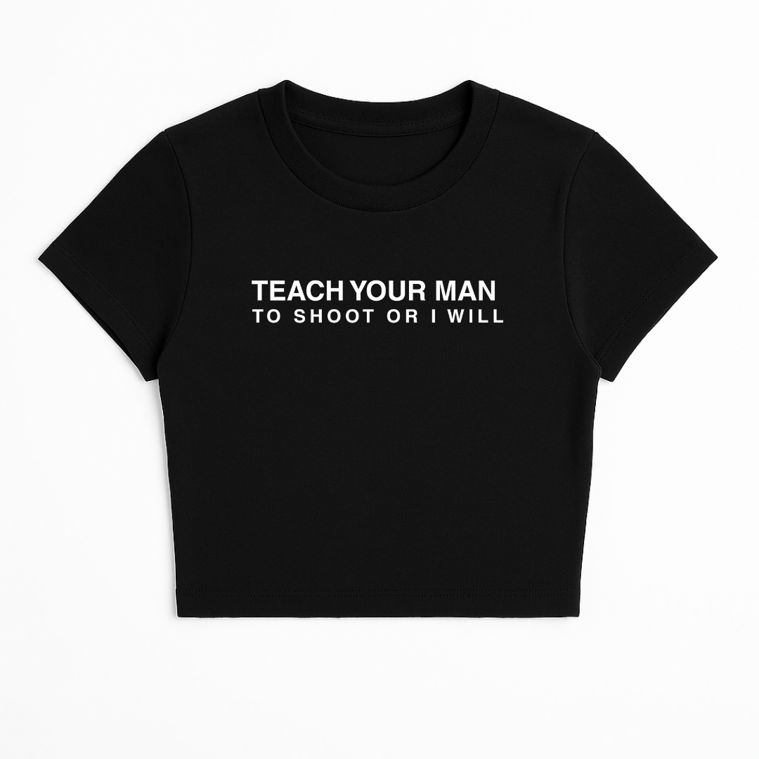 TEACH YOUR MAN TO SHOOT OR I WILL BABY TEE (MONOCHROME)