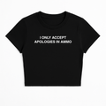 I ONLY ACCEPT APOLOGIES IN AMMO BABY TEE (MONOCHROME)