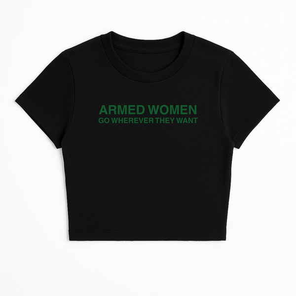 ARMED WOMEN CAN GO WHEREVER THEY WANT BABY TEE (GREEN FONT)