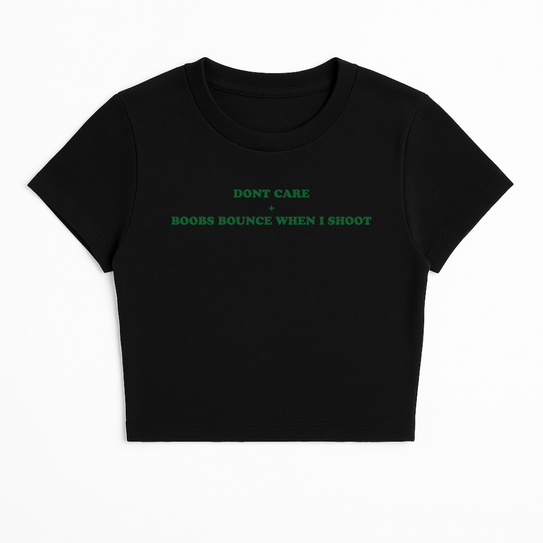 DON'T CARE + BOOBS BOUNCE WHEN I SHOOT BABY TEE (GREEN FONT)