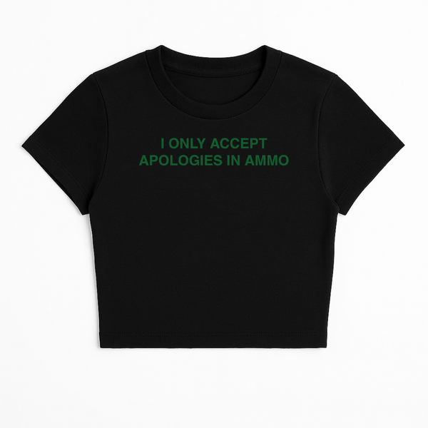 I ONLY ACCEPT APOLOGIES IN AMMO BABY TEE (GREEN FONT)