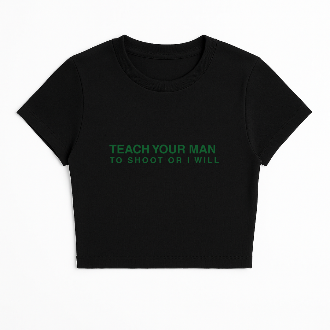 TEACH YOUR MAN TO SHOOT OR I WILL BABY TEE (GREEN FONT)