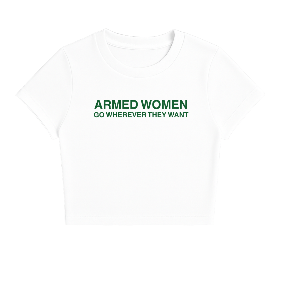 ARMED WOMEN CAN GO WHEREVER THEY WANT BABY TEE (GREEN FONT)