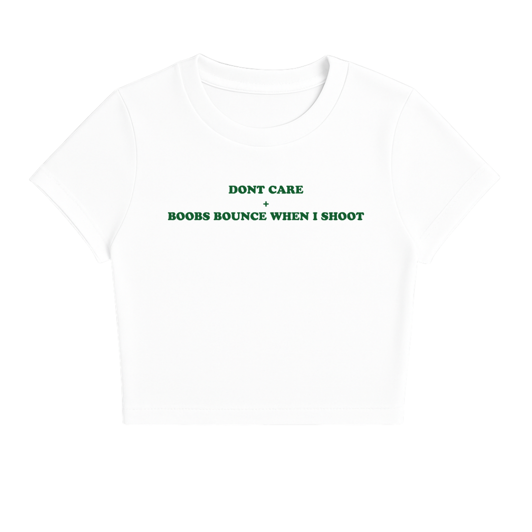 DON'T CARE + BOOBS BOUNCE WHEN I SHOOT BABY TEE (GREEN FONT)